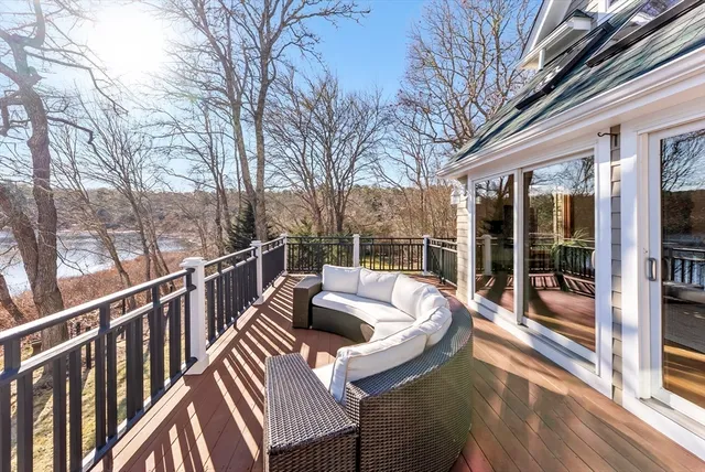 a view of balcony with furniture