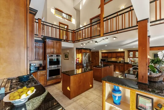 a view of a living room and workspace