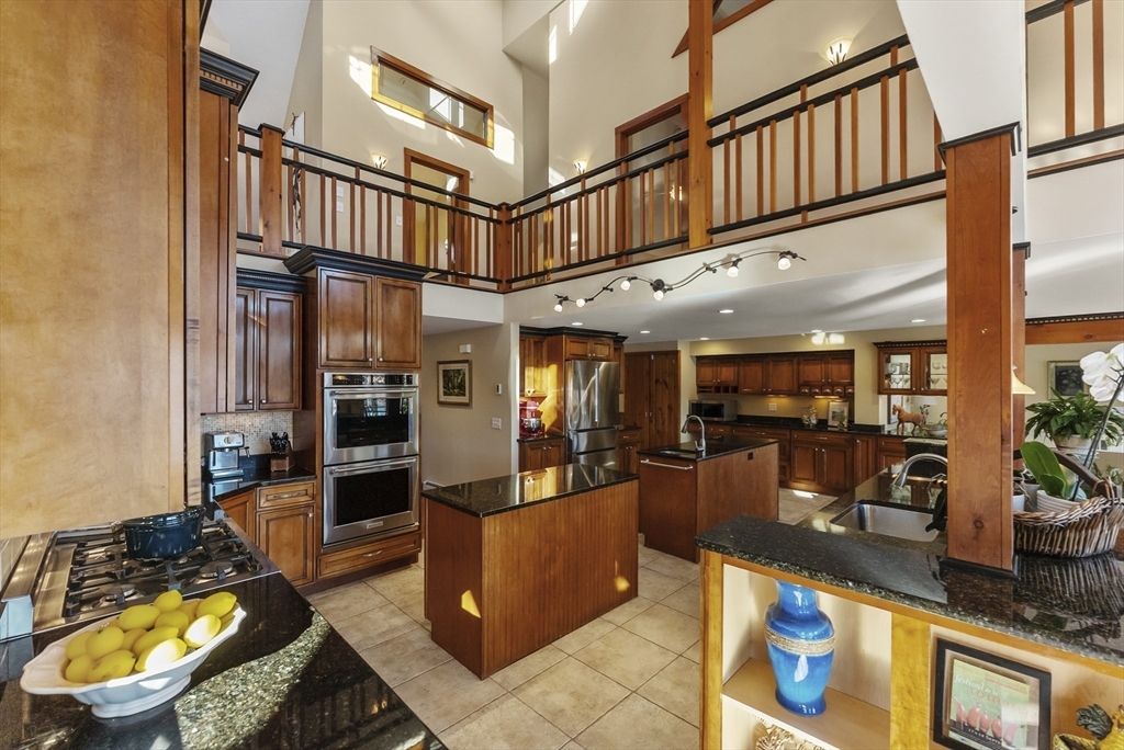 82 Lake Road Plymouth, MA 02360 - Photo 20 of 42 a view of a living room and workspace