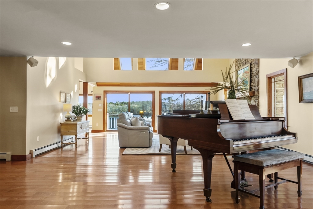 82 Lake Road Plymouth, MA 02360 - Photo 23 of 42 a living room with furniture and a large window