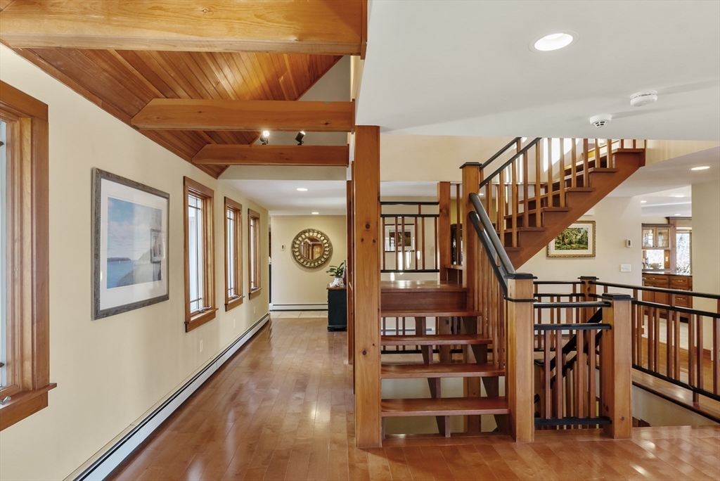 82 Lake Road Plymouth, MA 02360 - Photo 24 of 42 a view of entryway and hall with wooden floor