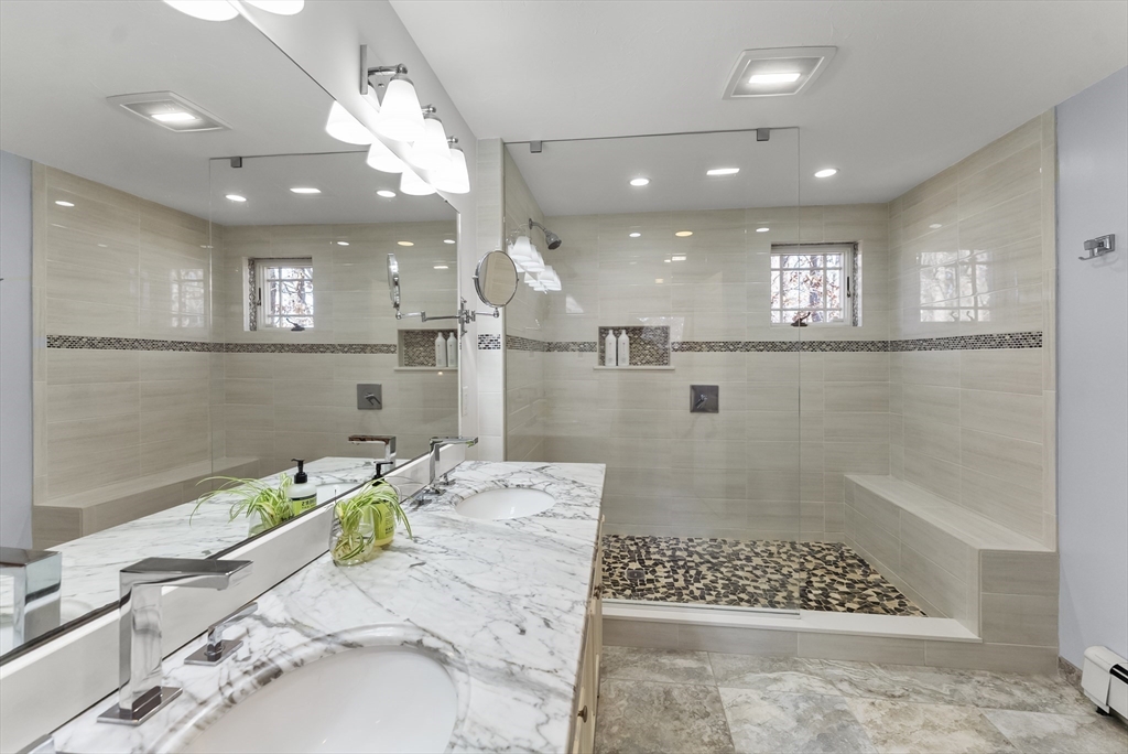 82 Lake Road Plymouth, MA 02360 - Photo 29 of 42 a bathroom with a sink a toilet and shower