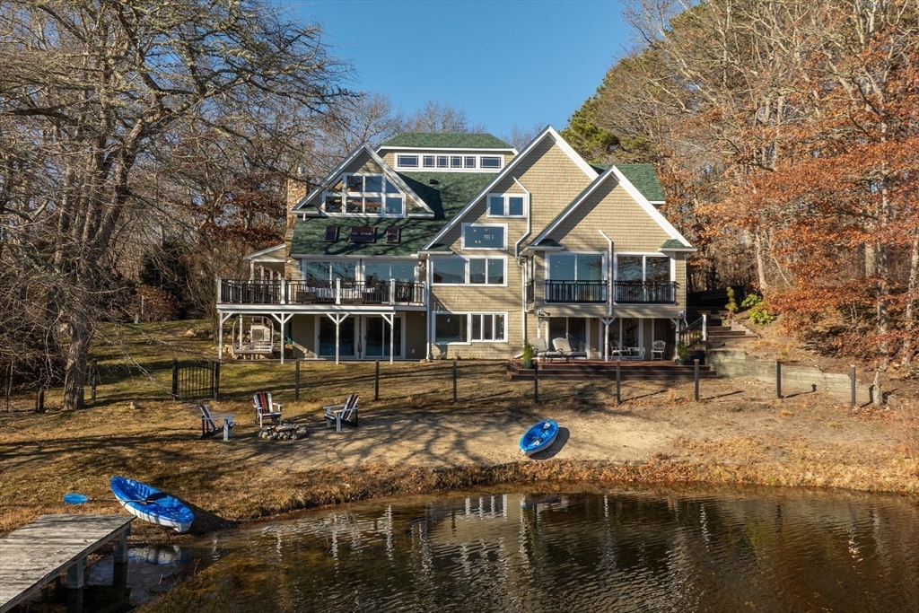 82 Lake Road Plymouth, MA 02360 - Photo 3 of 42 a front view of a house with lake view
