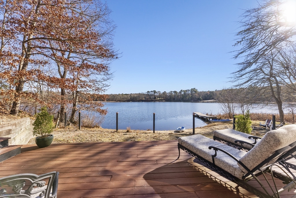 82 Lake Road Plymouth, MA 02360 - Photo 35 of 42 a view of a terrace with trees
