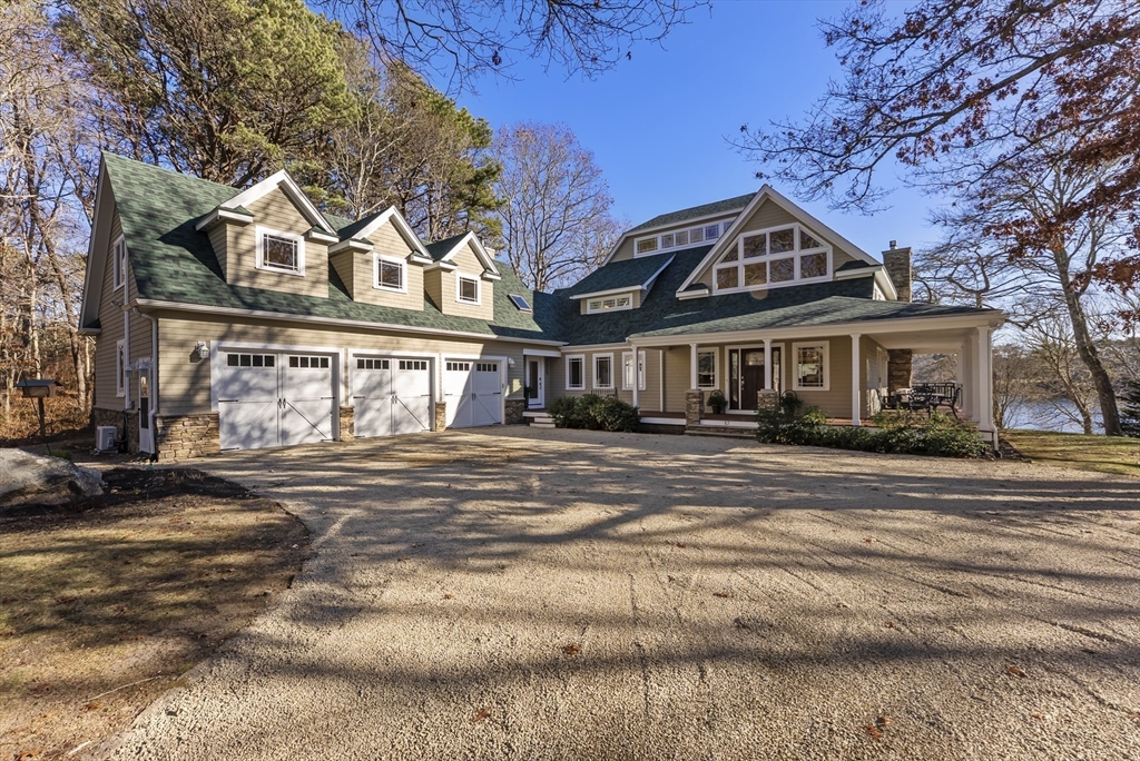 82 Lake Road Plymouth, MA 02360 - Photo 4 of 42 a front view of a house with a yard