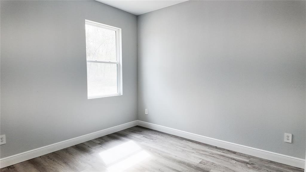 7 Spring Pass Ocala, FL 34472 - Photo 29 of 35 an empty room with a window