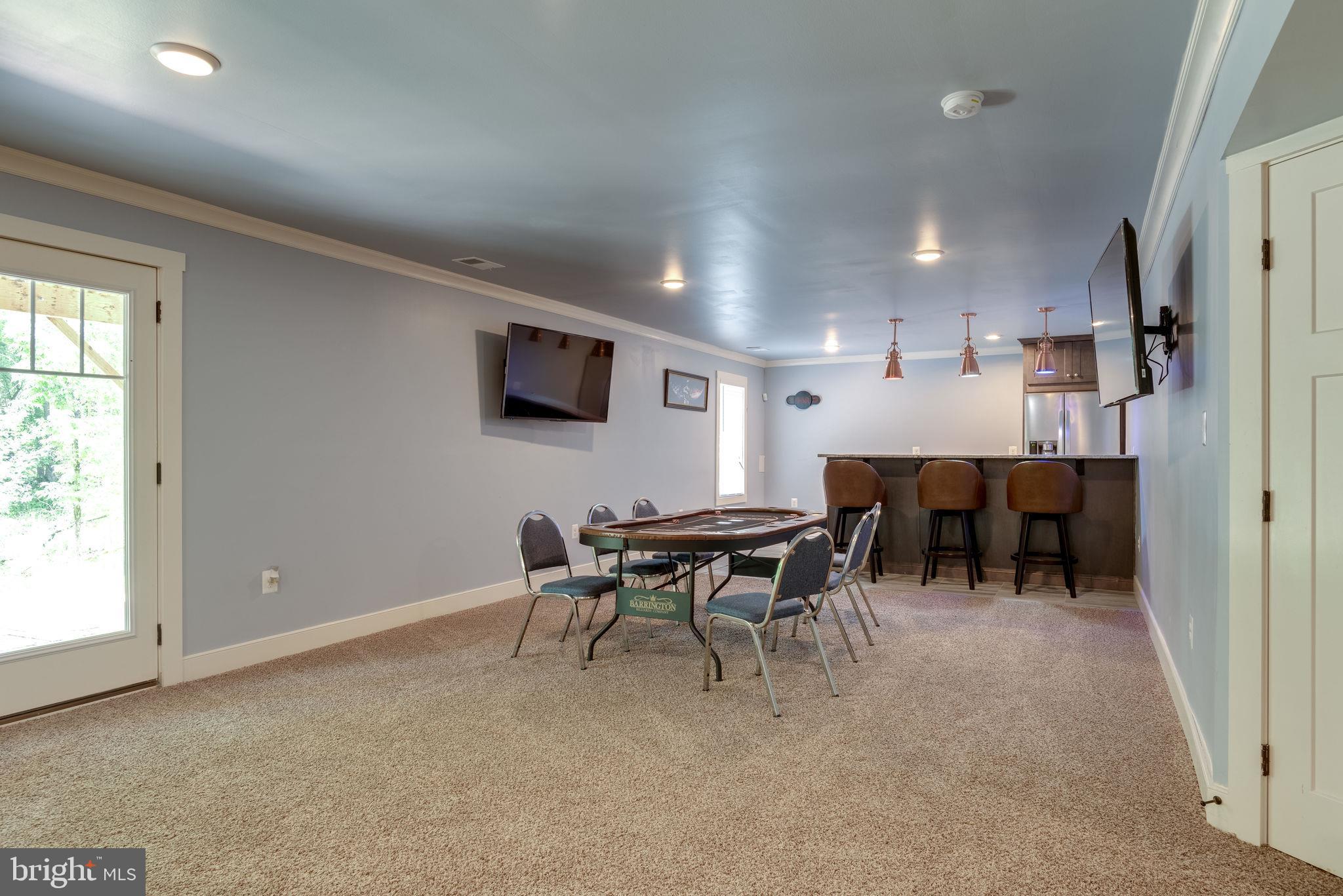 14524 Lightner Road Haymarket, VA 20169 - Photo 56 of 78 Lower Level Bar & Game Room Area