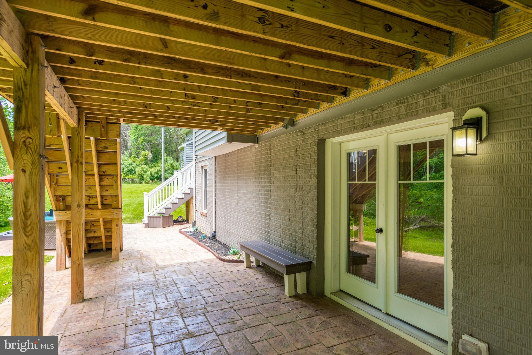14524 Lightner Road Haymarket, VA 20169 - Photo 72 of 78 Lower Level Stamped Concrete Patio