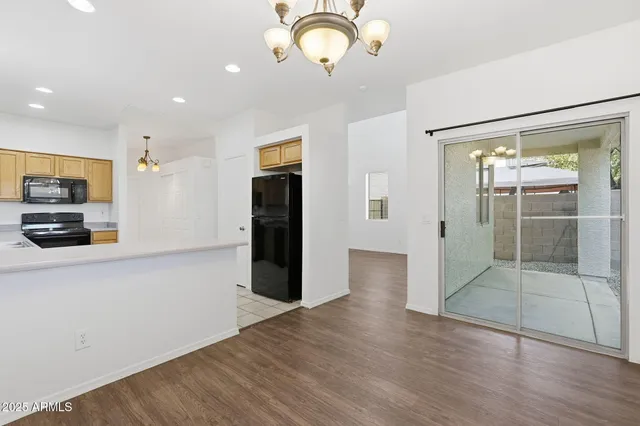 a spacious bathroom with a double vanity sink and a mirror