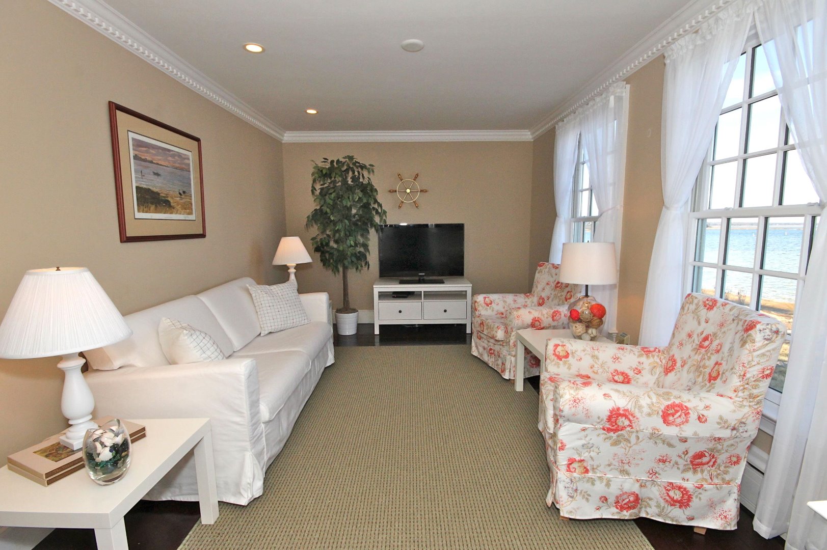 9 Fowler Avenue Edgartown, MA 02539 - Photo 15 of 28 a living room with furniture and a flat screen tv