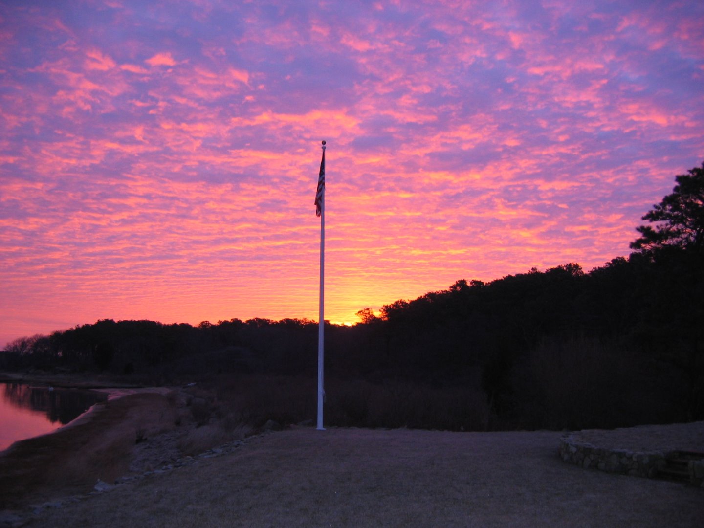 9 Fowler Avenue Edgartown, MA 02539 - Photo 28 of 28 a view of a road with a tree in the background