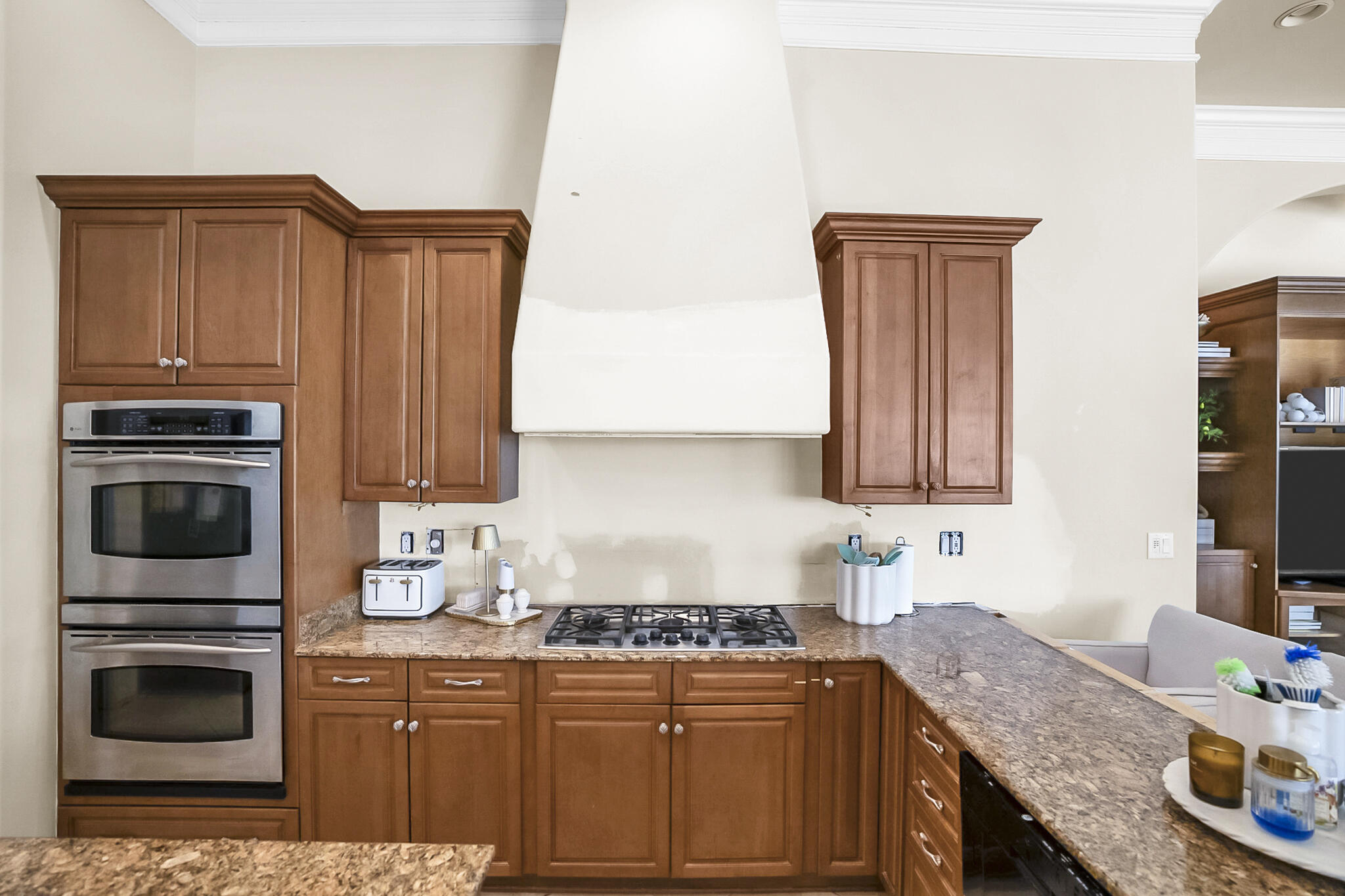 4372 Stonebridge Road Destin, FL 32541 - Photo 15 of 83 a kitchen with granite countertop a stove sink and cabinets