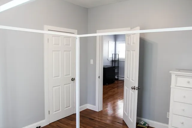 a view of entryway with wooden floor