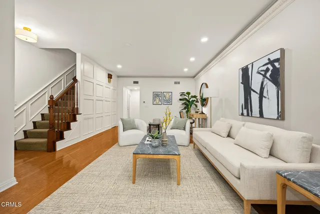 a view of a dining room and a table and chairs