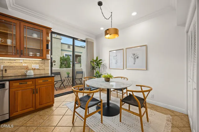 a kitchen with stainless steel appliances granite countertop a stove sink and cabinets