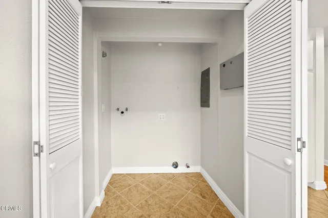 a bathroom with a toilet a sink and a mirror