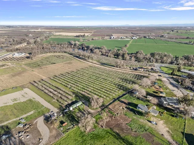 a view of a city with an ocean view