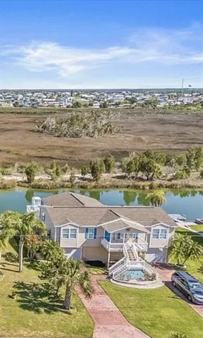 a view of a city with an ocean view