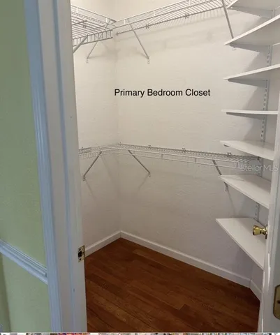 a view of a room with racks on the wall