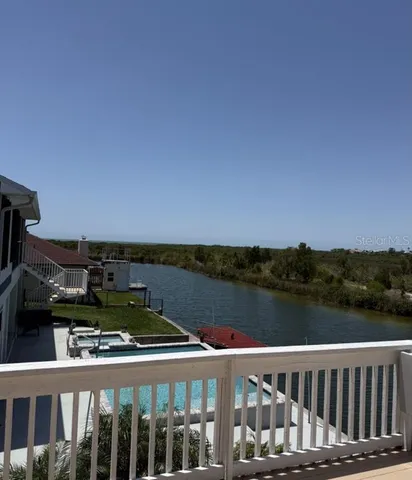 a view of a balcony with city view