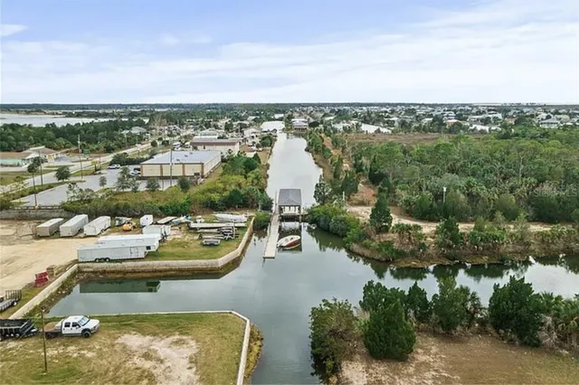 a view of a lake with a city