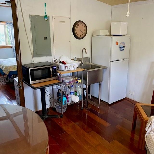 1264 Malaihi Road Wailuku, HI 96793 - Photo 13 of 17 a living room with furniture and a clock