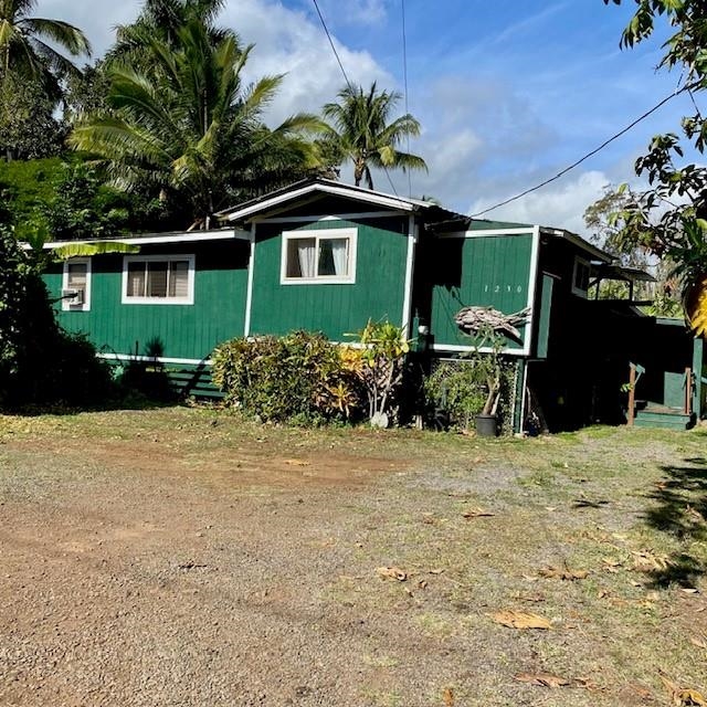 1264 Malaihi Road Wailuku, HI 96793 - Photo 9 of 17 a front view of a house with a yard