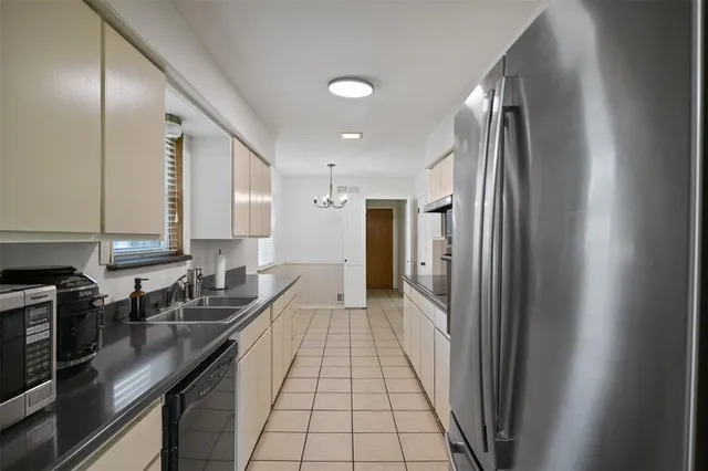 a bathroom with a sink a mirror and a shower