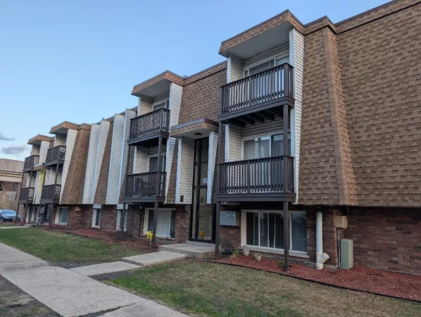 a view of a large building with a door