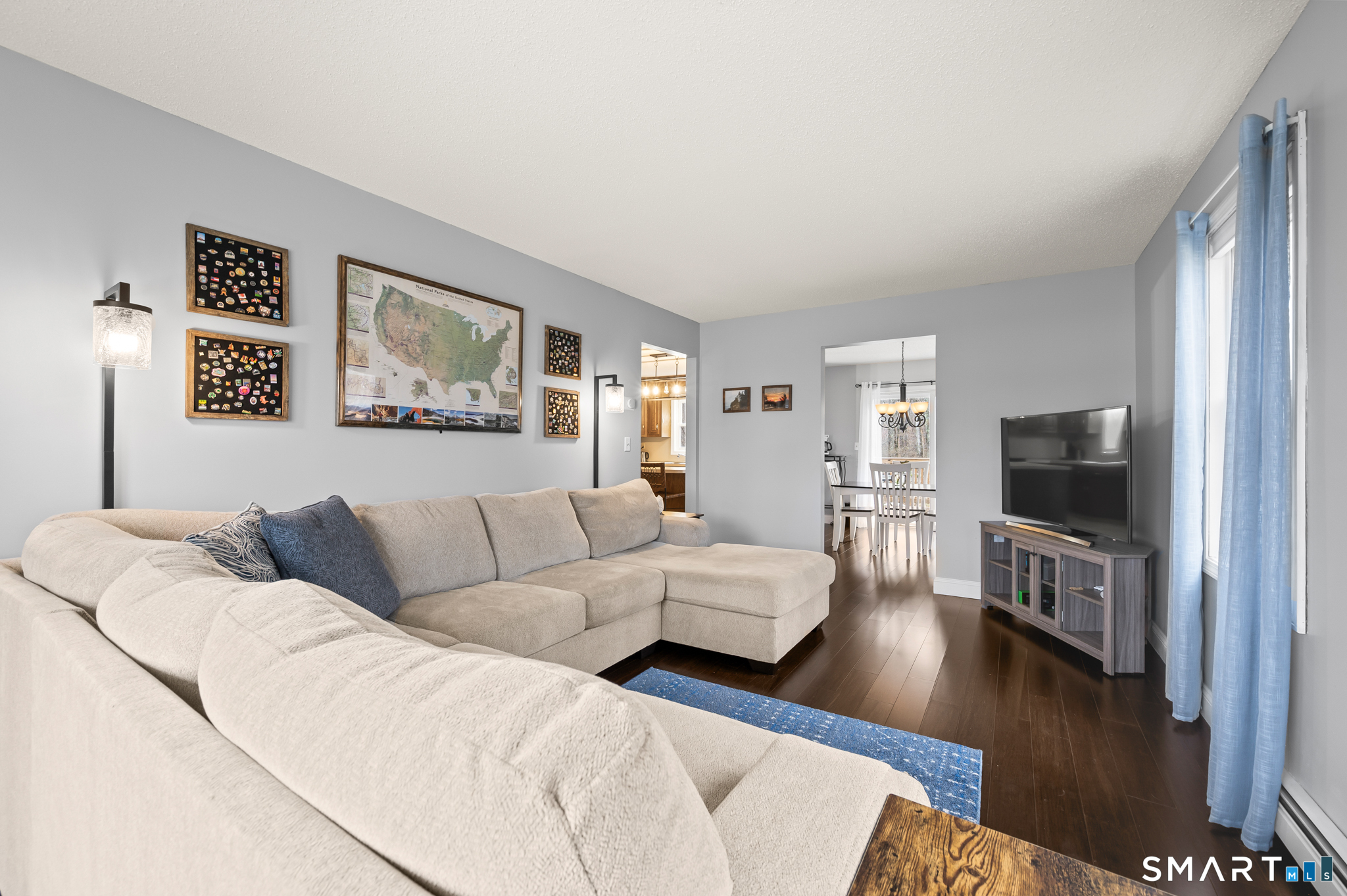 146 Lakeside Drive Andover, CT 06232 - Photo 11 of 35 a living room with furniture and a flat screen tv