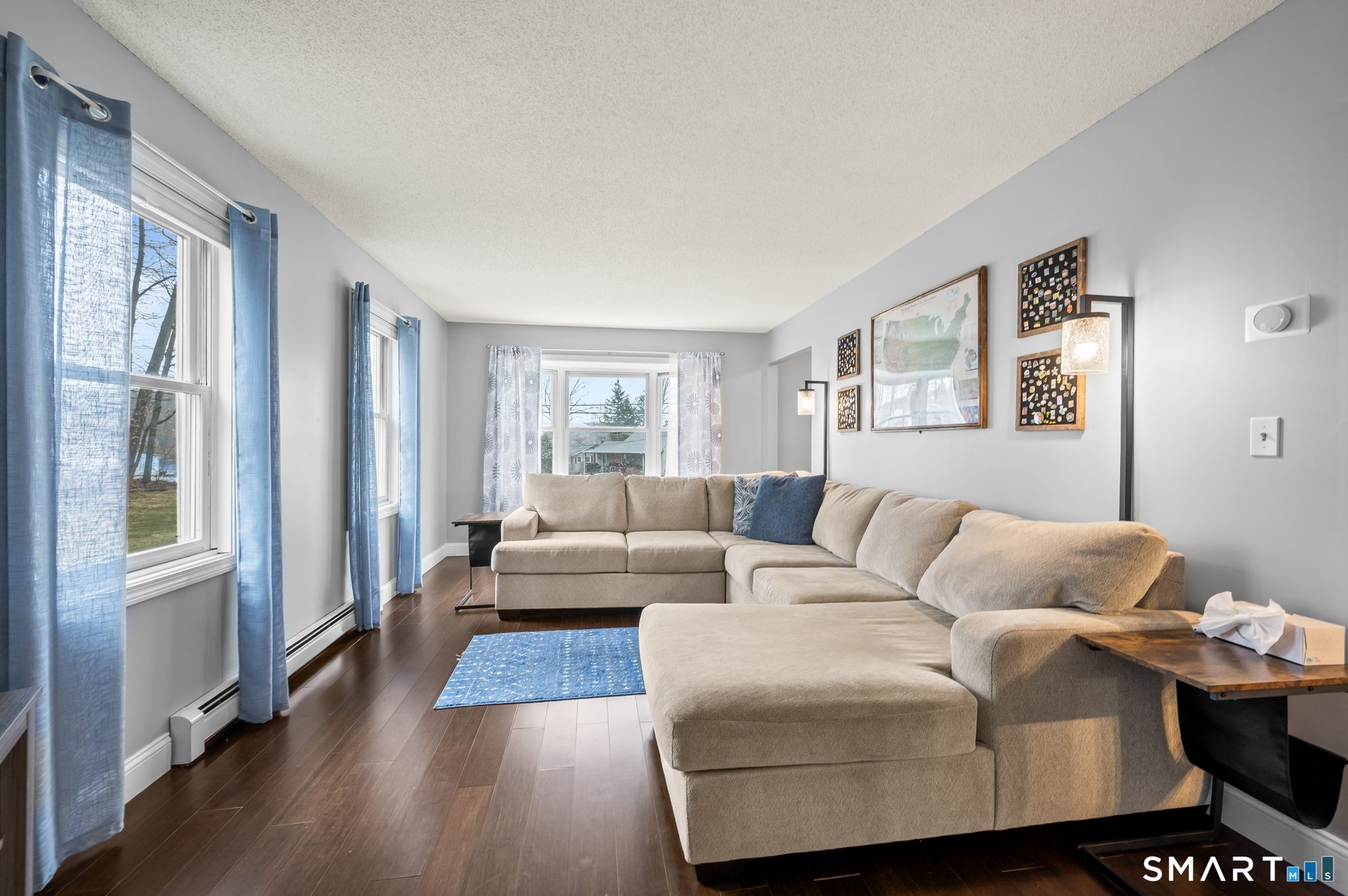 146 Lakeside Drive Andover, CT 06232 - Photo 12 of 35 a living room with furniture and a window