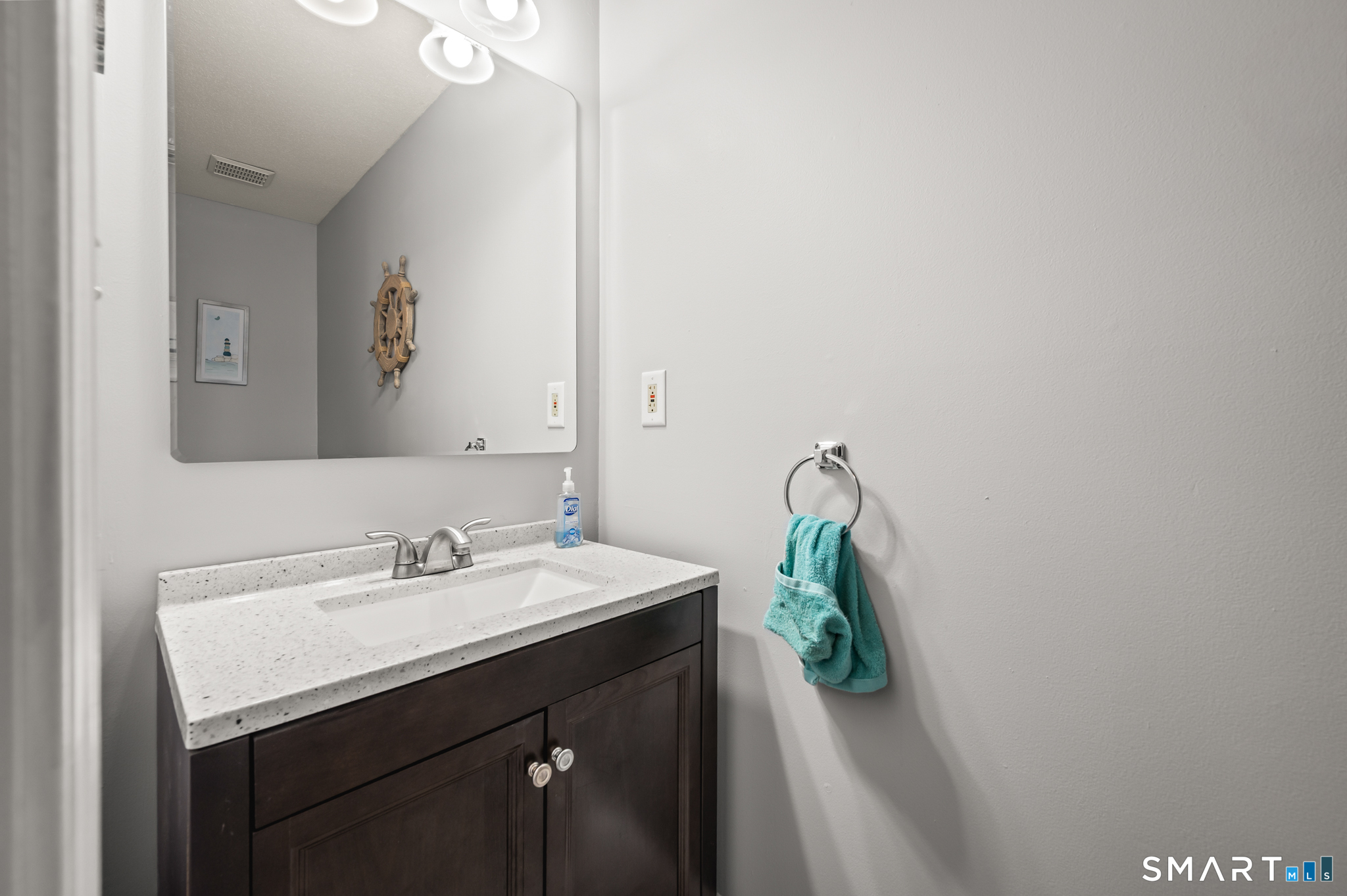 146 Lakeside Drive Andover, CT 06232 - Photo 14 of 35 a bathroom with a sink and a mirror