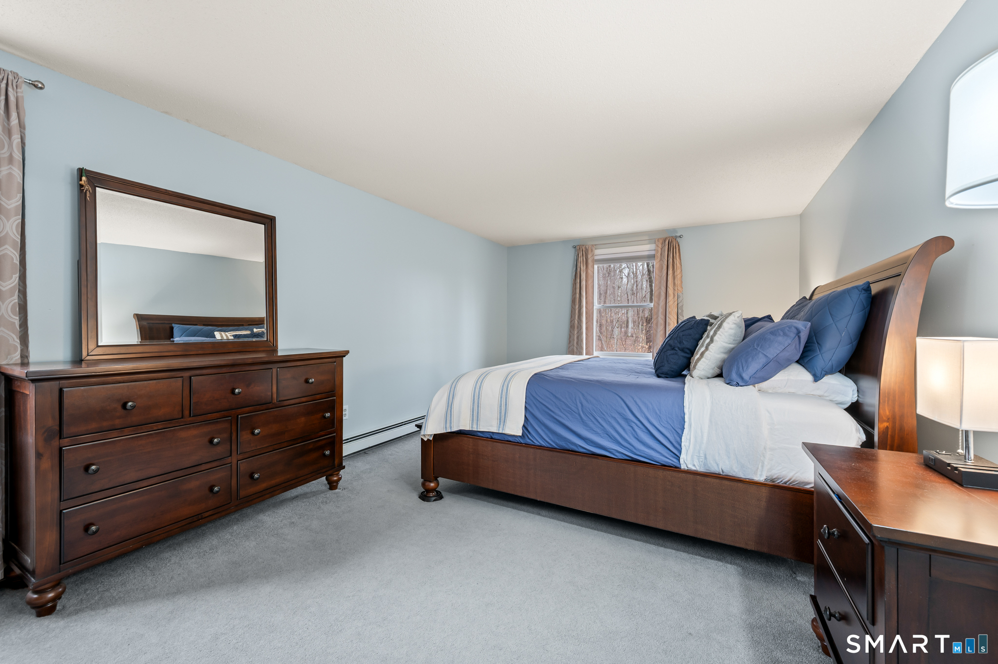 146 Lakeside Drive Andover, CT 06232 - Photo 16 of 35 a bedroom with a bed and a dresser in it