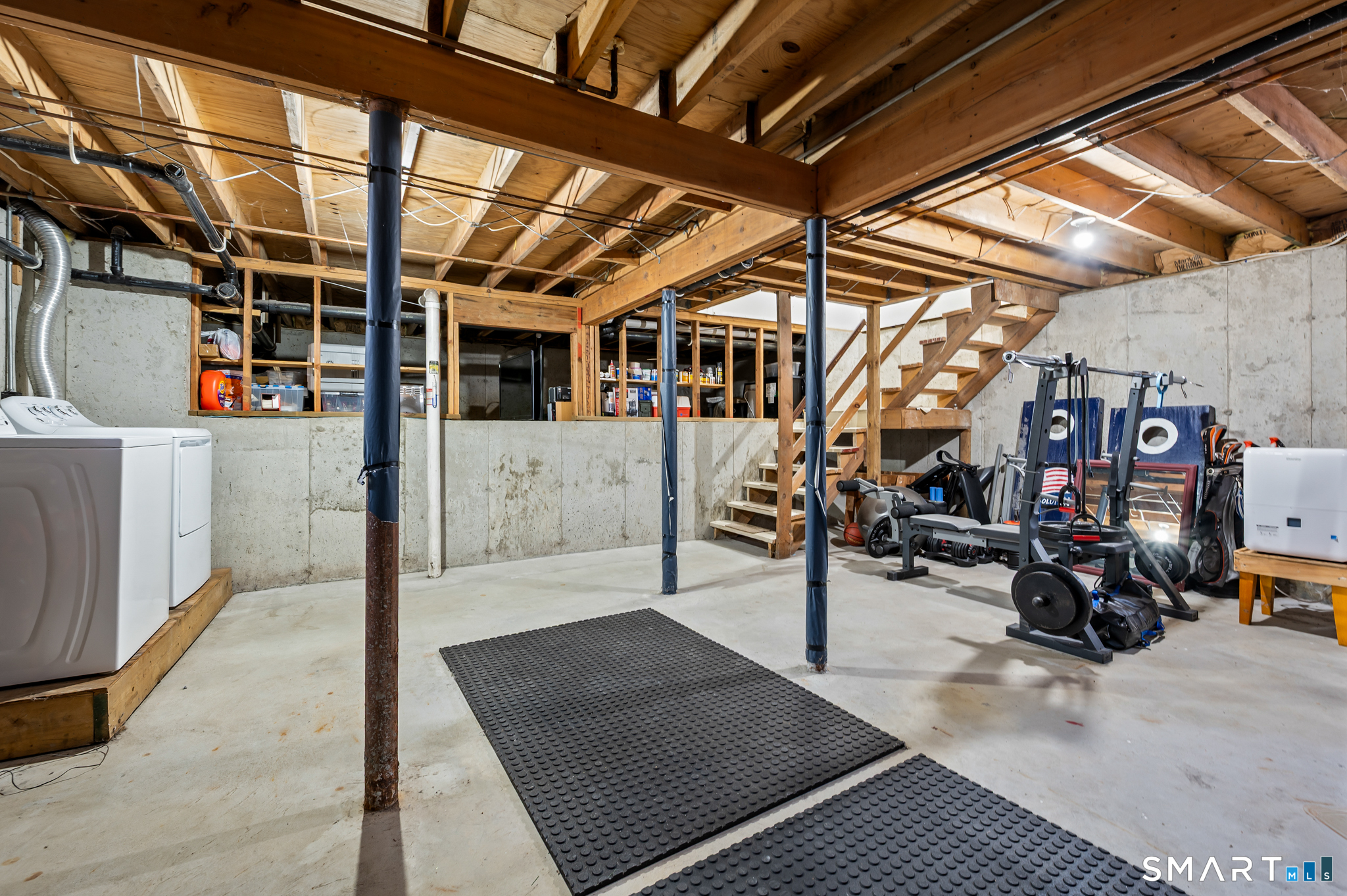 146 Lakeside Drive Andover, CT 06232 - Photo 23 of 35 a view of parking garage with cars