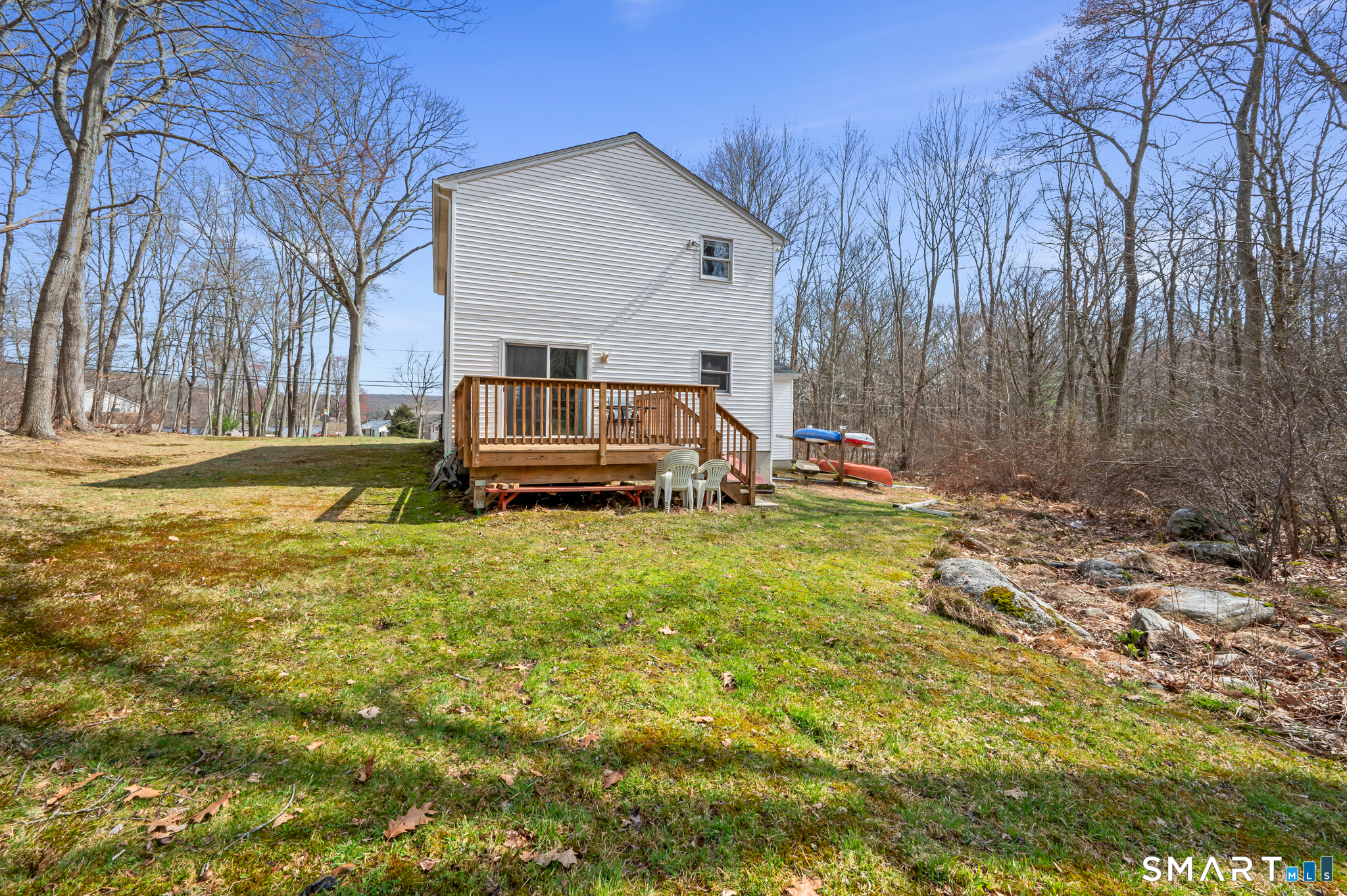 146 Lakeside Drive Andover, CT 06232 - Photo 28 of 35 a front view of a house with garden