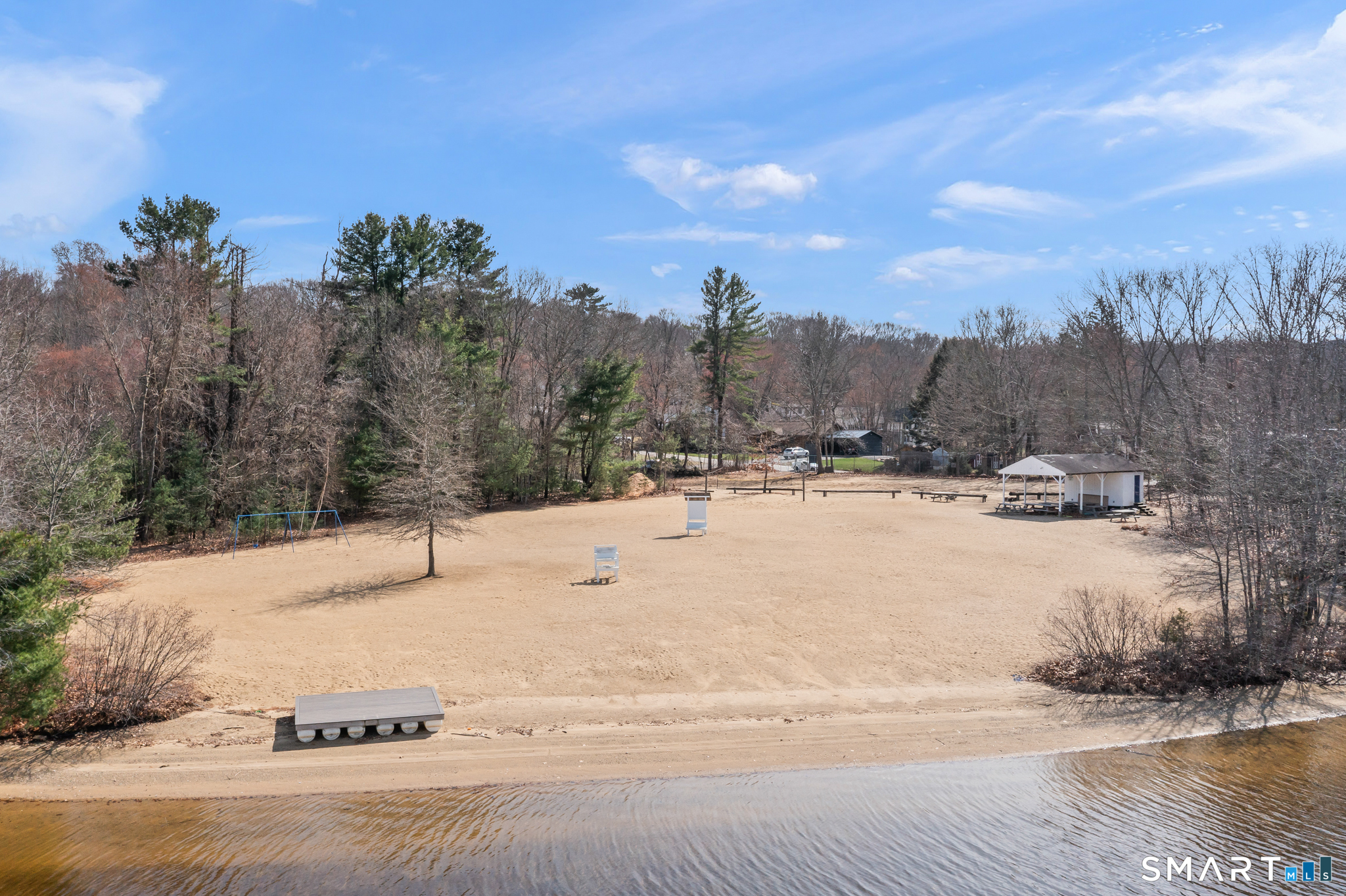 146 Lakeside Drive Andover, CT 06232 - Photo 29 of 35 a view of a yard with a house