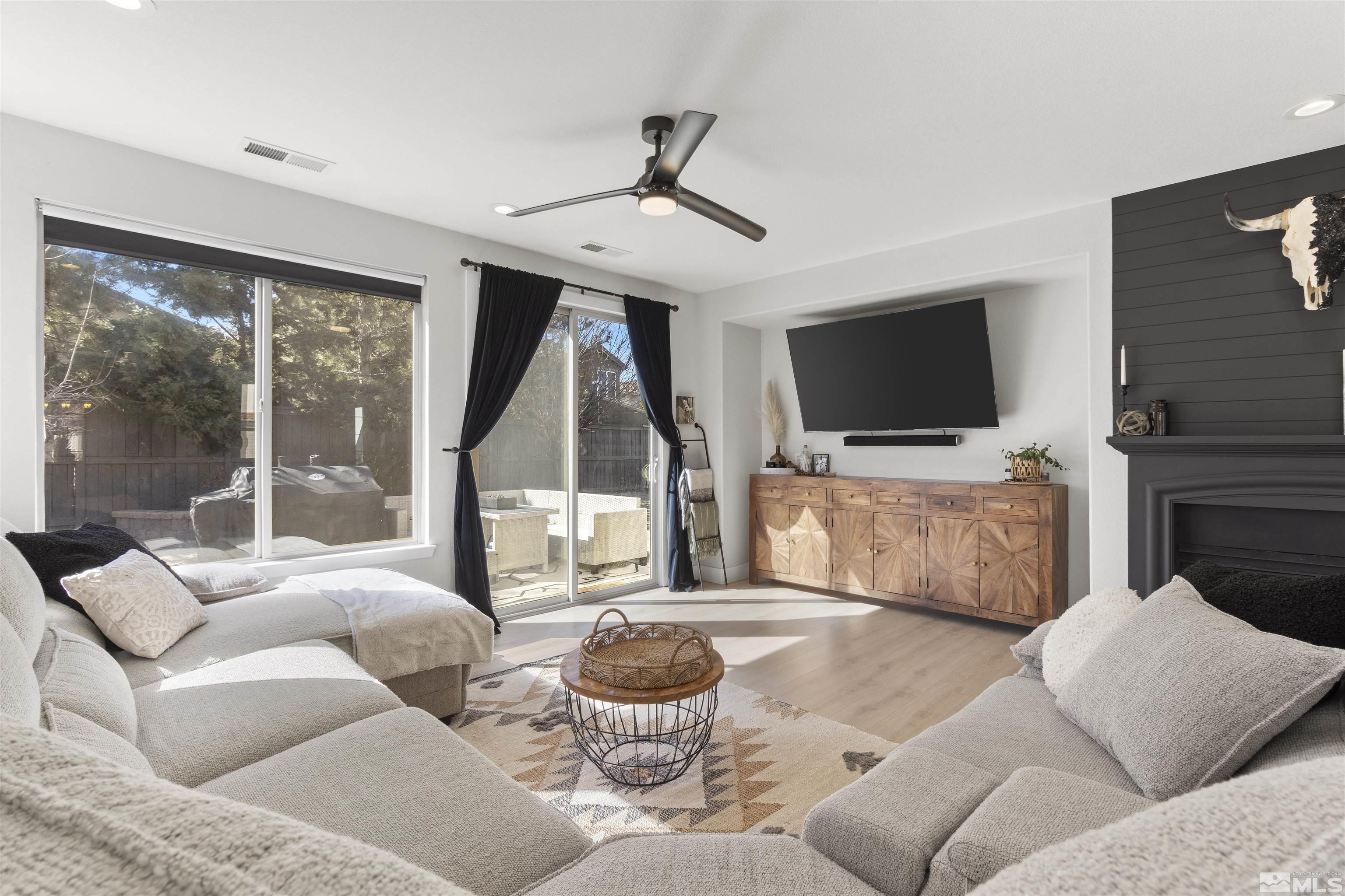 490 Haleb Court Reno, NV 89521 - Photo 12 of 26 a living room with furniture and a flat screen tv
