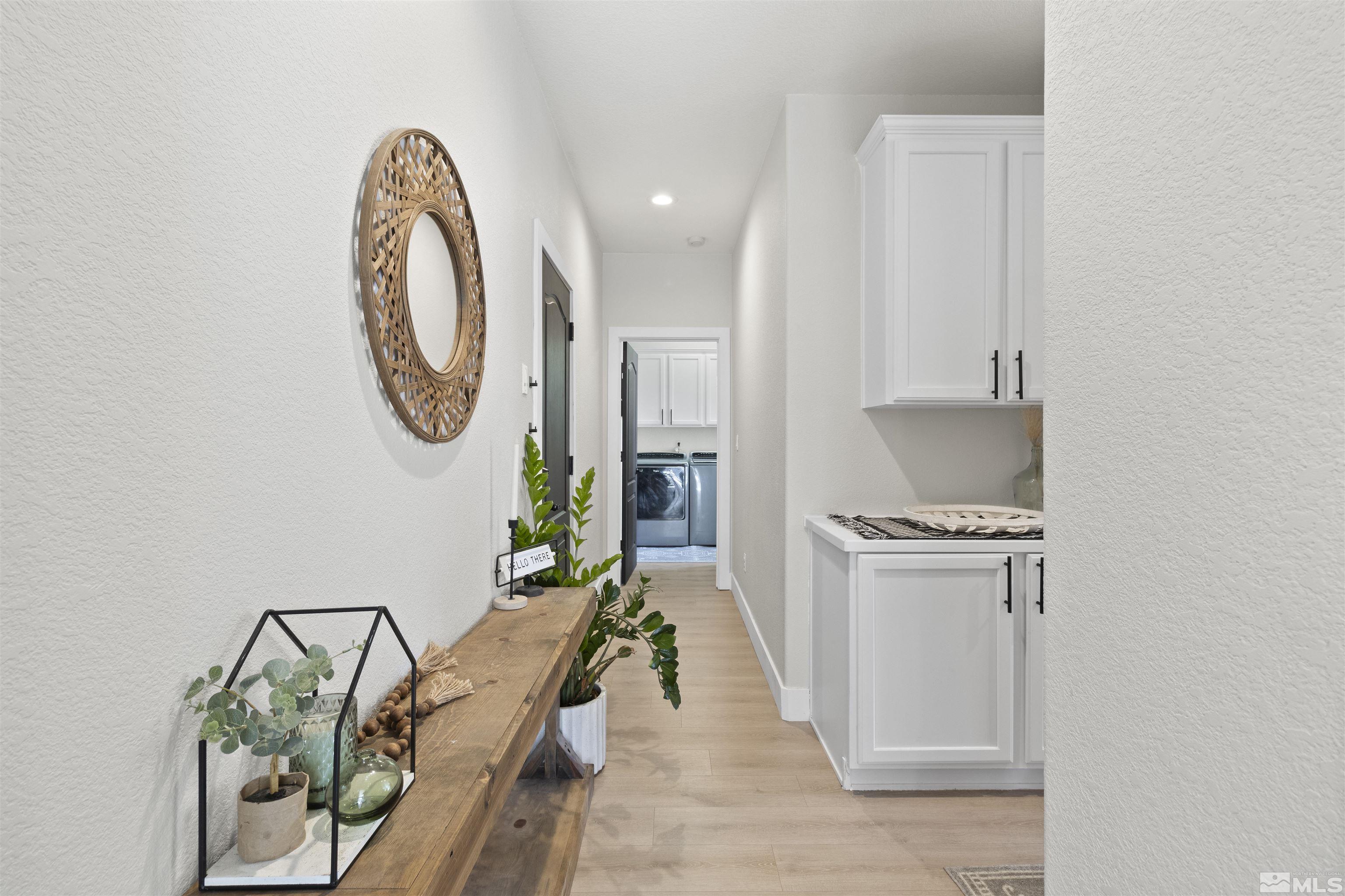 490 Haleb Court Reno, NV 89521 - Photo 23 of 26 a living room with furniture and a mirror