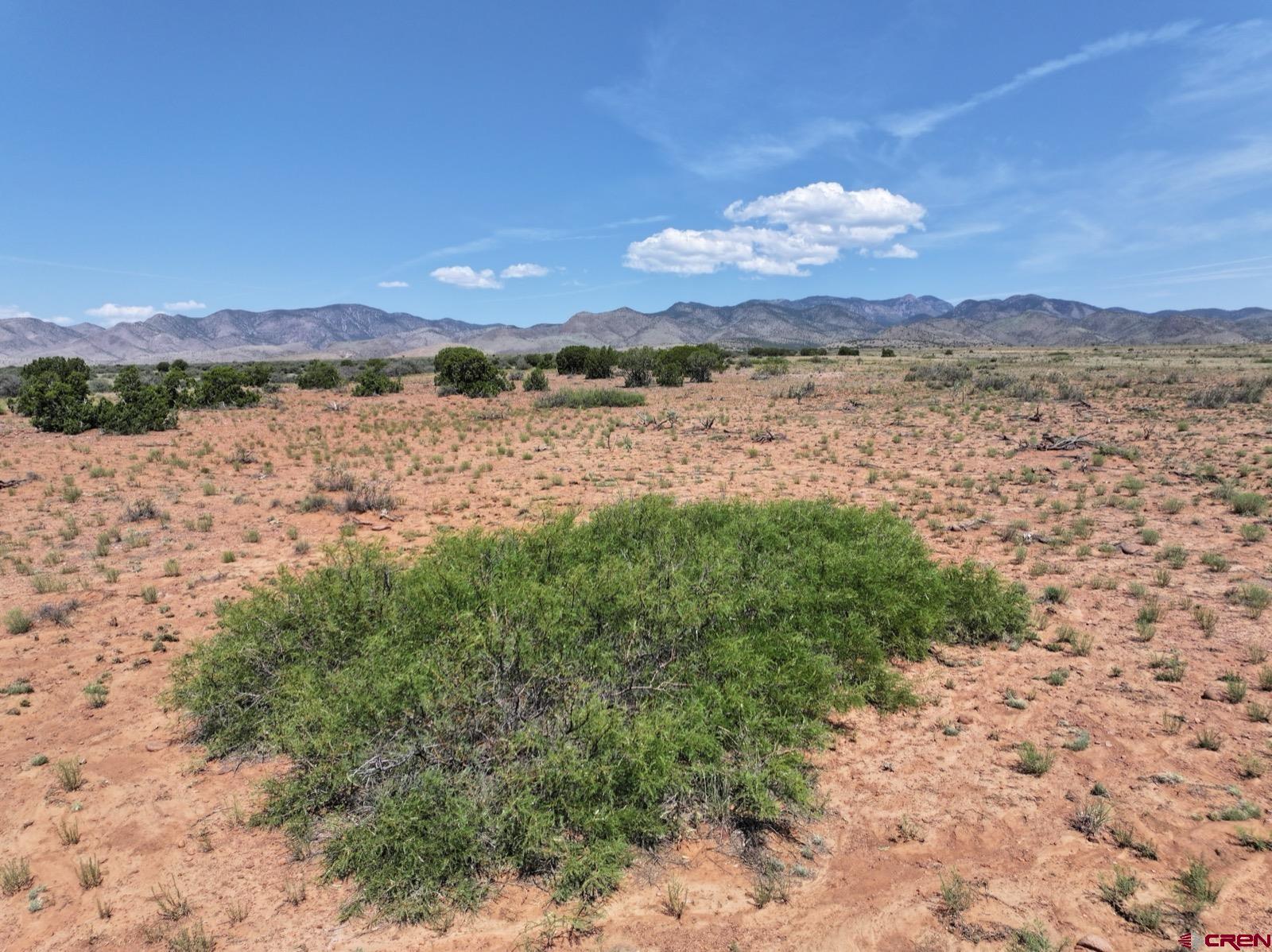 0 Cienega Camp Road Magdalena, NM 87825 - Photo 3 of 16 a view of lake with mountain in the background