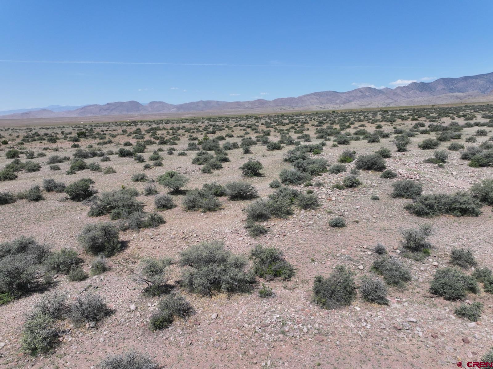 0 Cienega Camp Road Magdalena, NM 87825 - Photo 10 of 16 a view of a city with mountains in the background