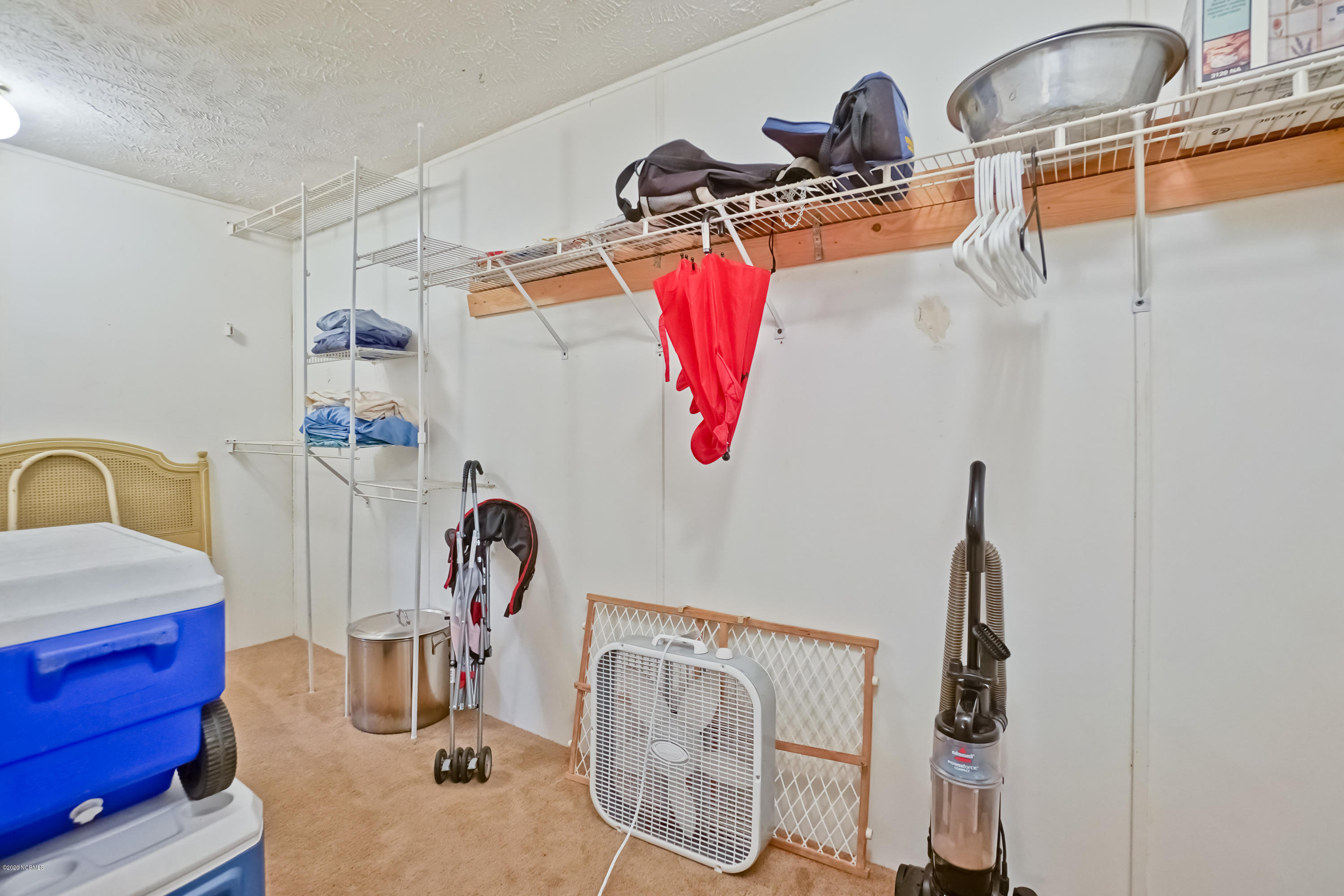 5468 Wren Road Southwest Ocean Isle Beach, NC 28469 - Photo 20 of 31 Walk-In Closet