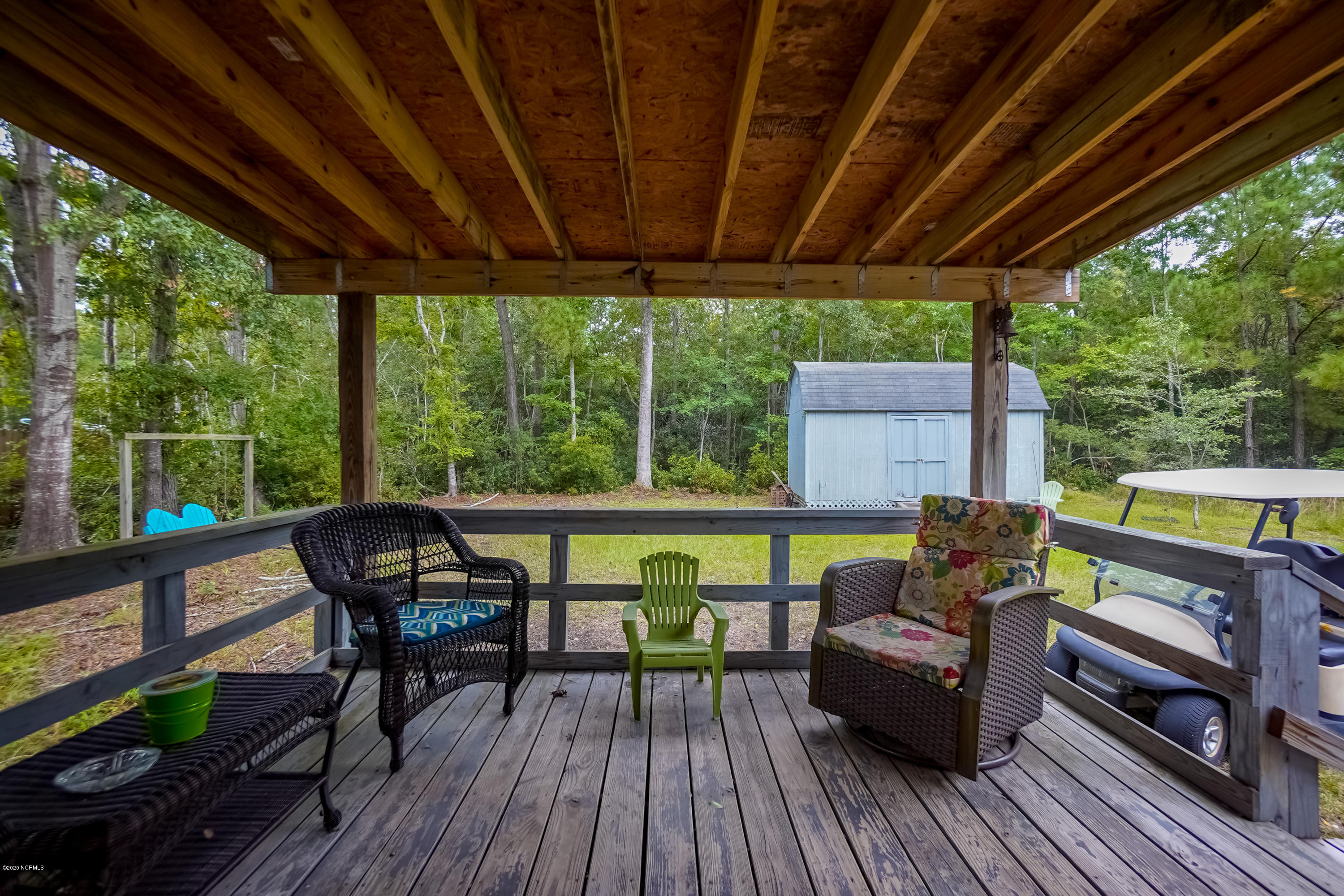 5468 Wren Road Southwest Ocean Isle Beach, NC 28469 - Photo 25 of 31 Covered Deck