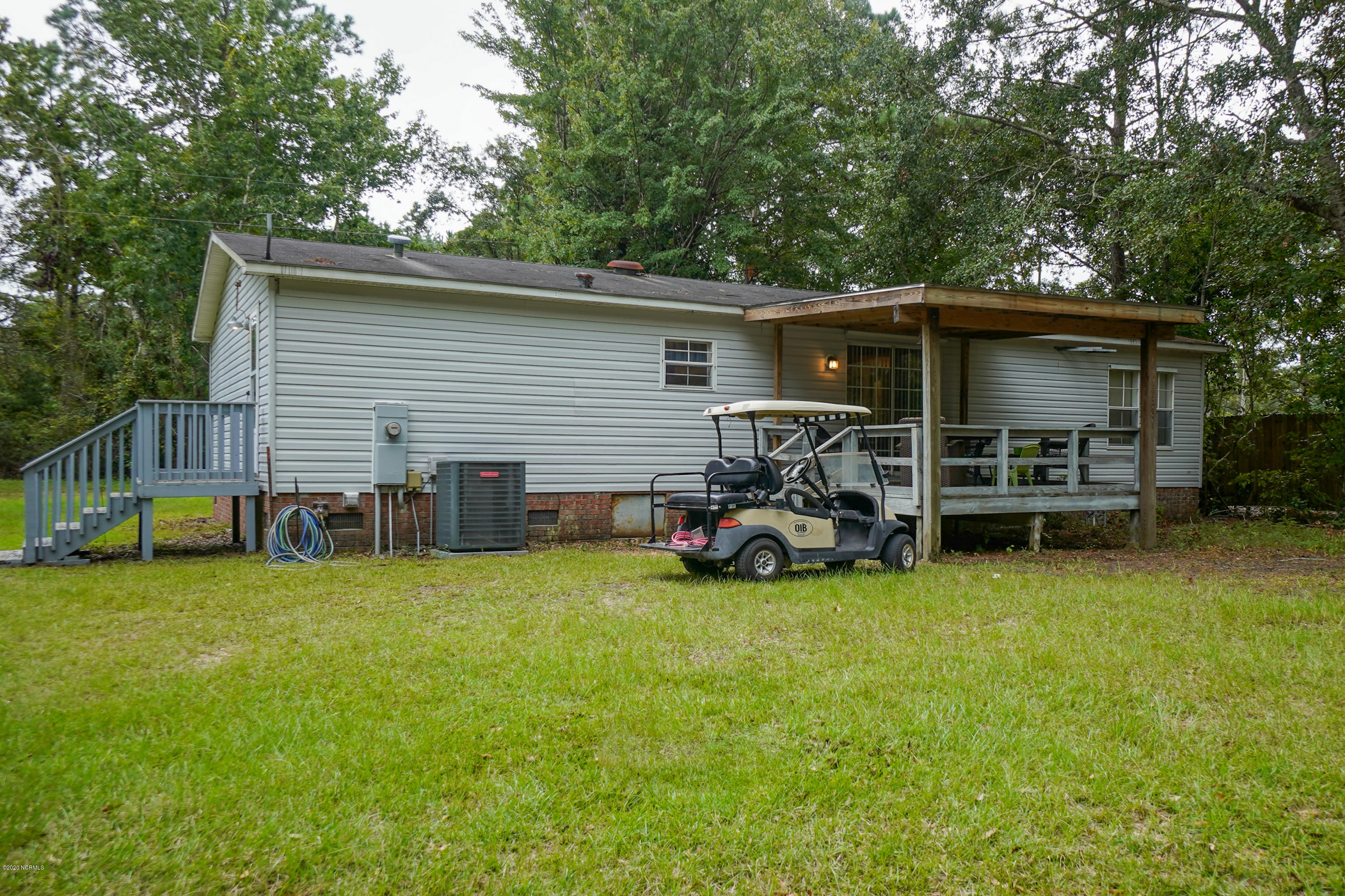 5468 Wren Road Southwest Ocean Isle Beach, NC 28469 - Photo 4 of 31 Back of Home