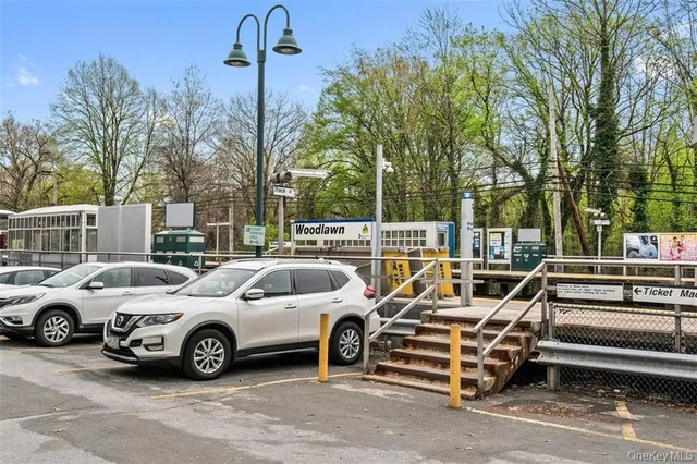 a view of a cars park in front of a house