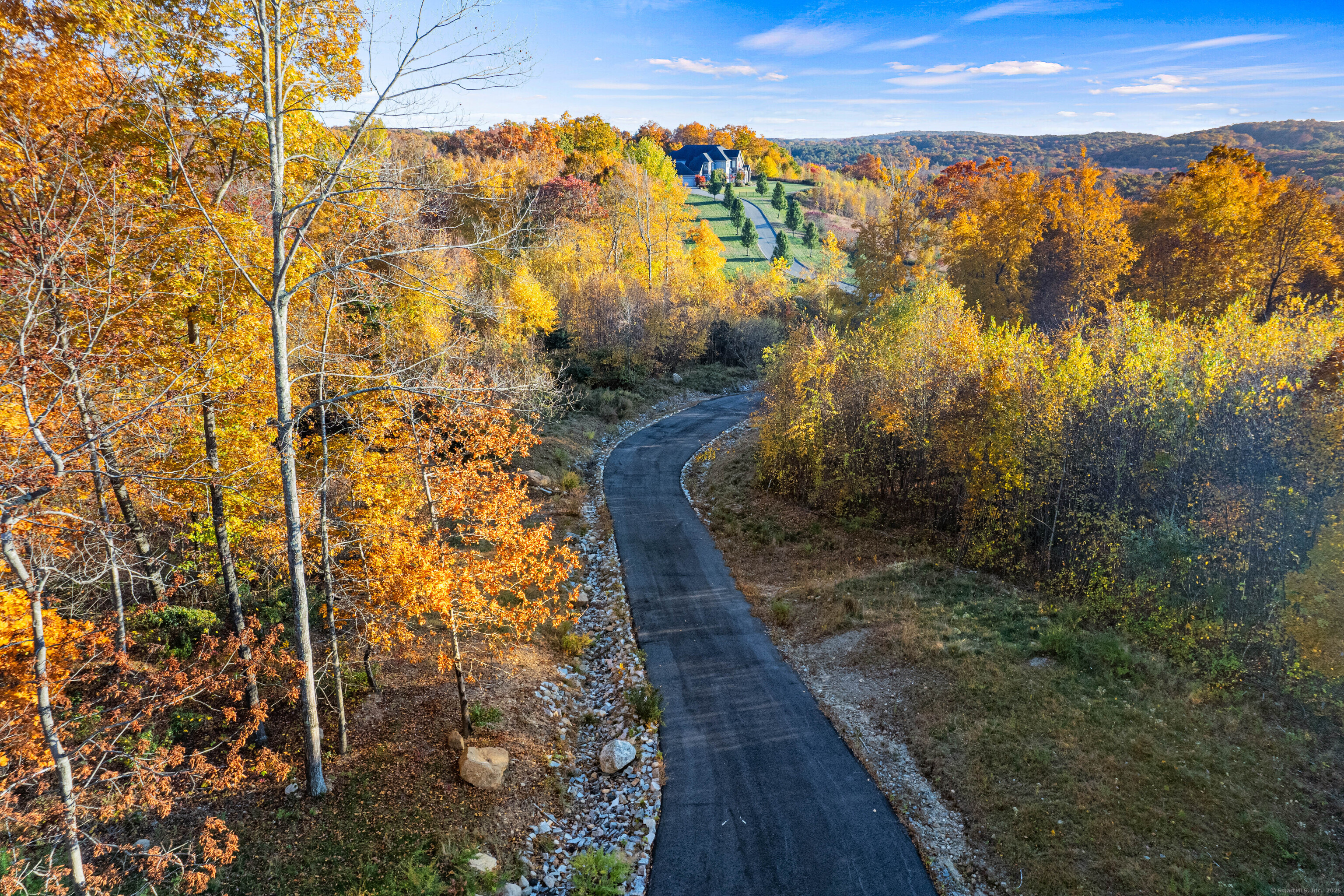 29 Rocco Drive East Lyme, CT 06333 - Photo 4 of 12 a view of a pathway both side of building