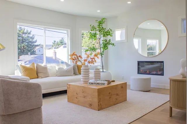 a bedroom with a bed and lamp