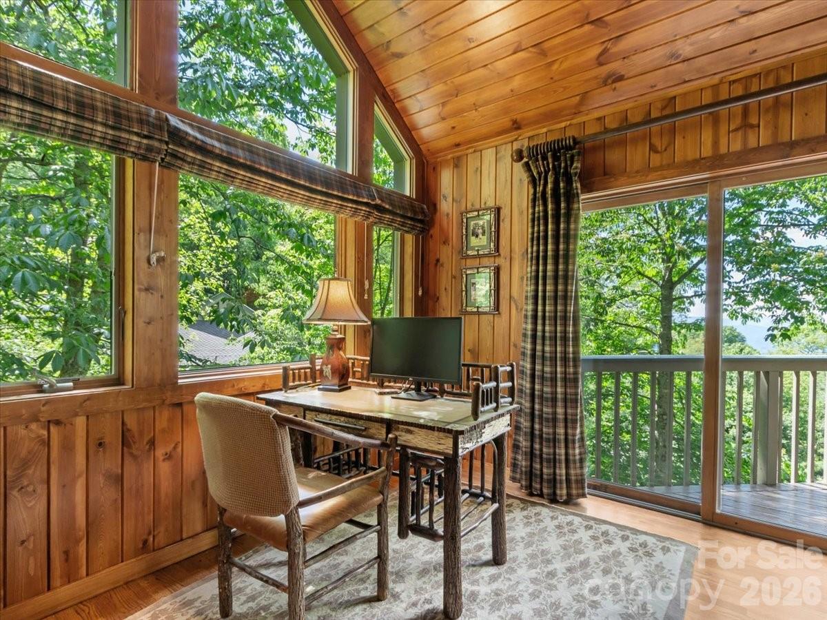 121 Ivy Ridge Road Burnsville, NC 28714 - Photo 18 of 48 a view of an outdoor space with a table and chairs