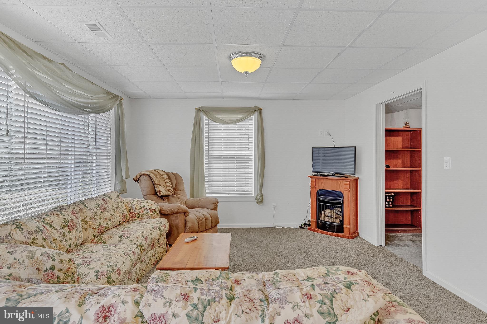 10120 Mackall Road St. Leonard, MD 20685 - Photo 23 of 29 a bedroom with a bed and a window