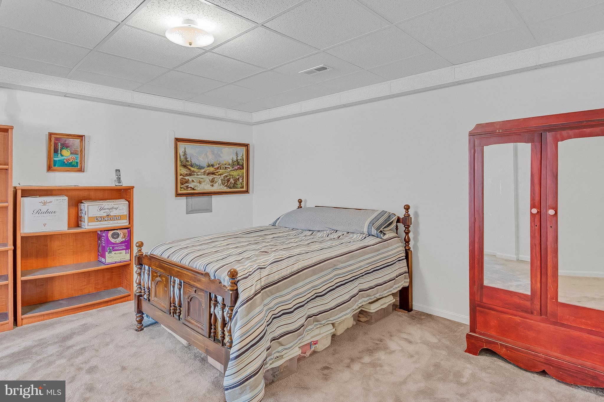 10120 Mackall Road St. Leonard, MD 20685 - Photo 27 of 29 a bedroom with a bed and a window