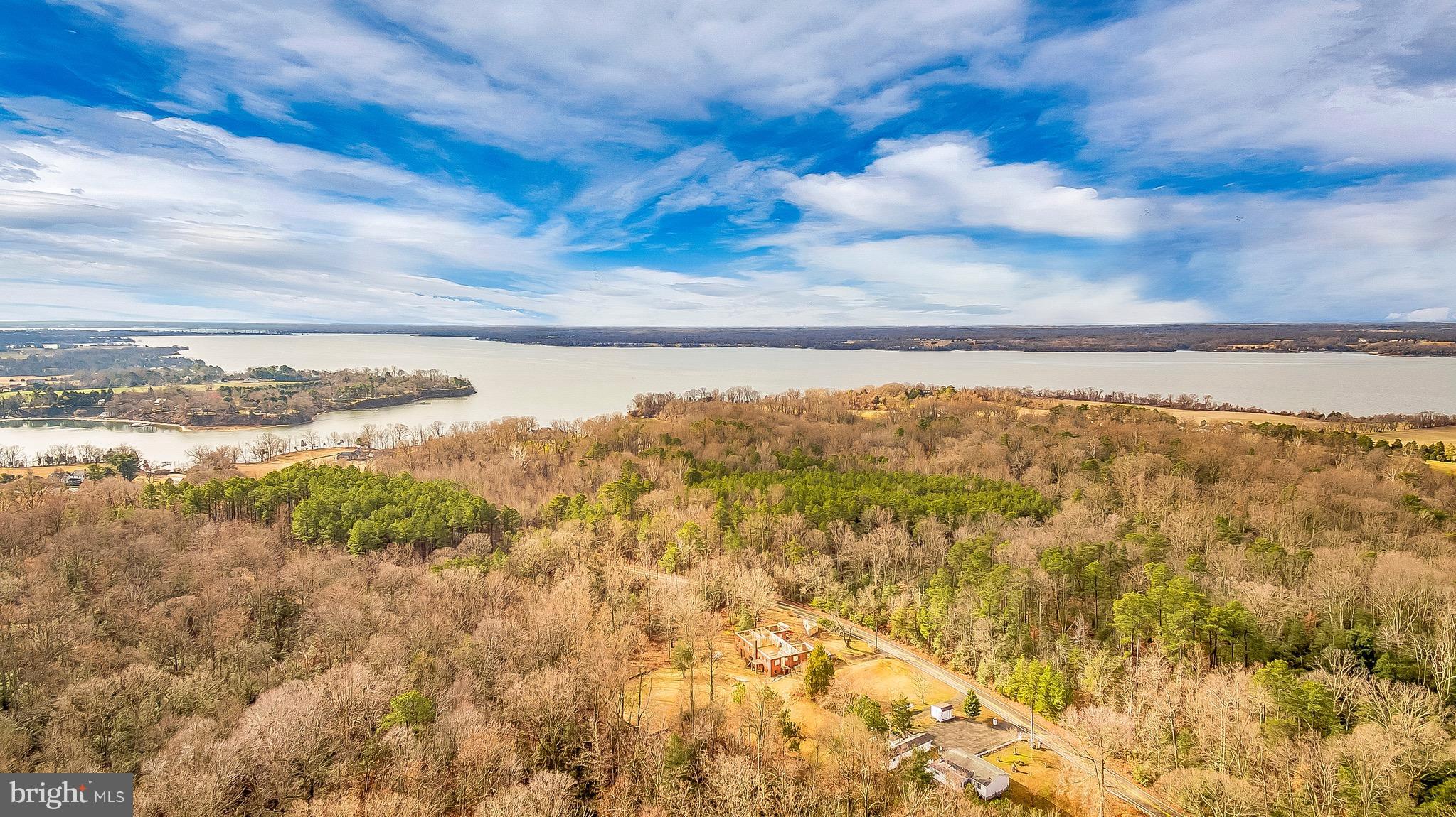 10120 Mackall Road St. Leonard, MD 20685 - Photo 7 of 29 a view of lake and mountain